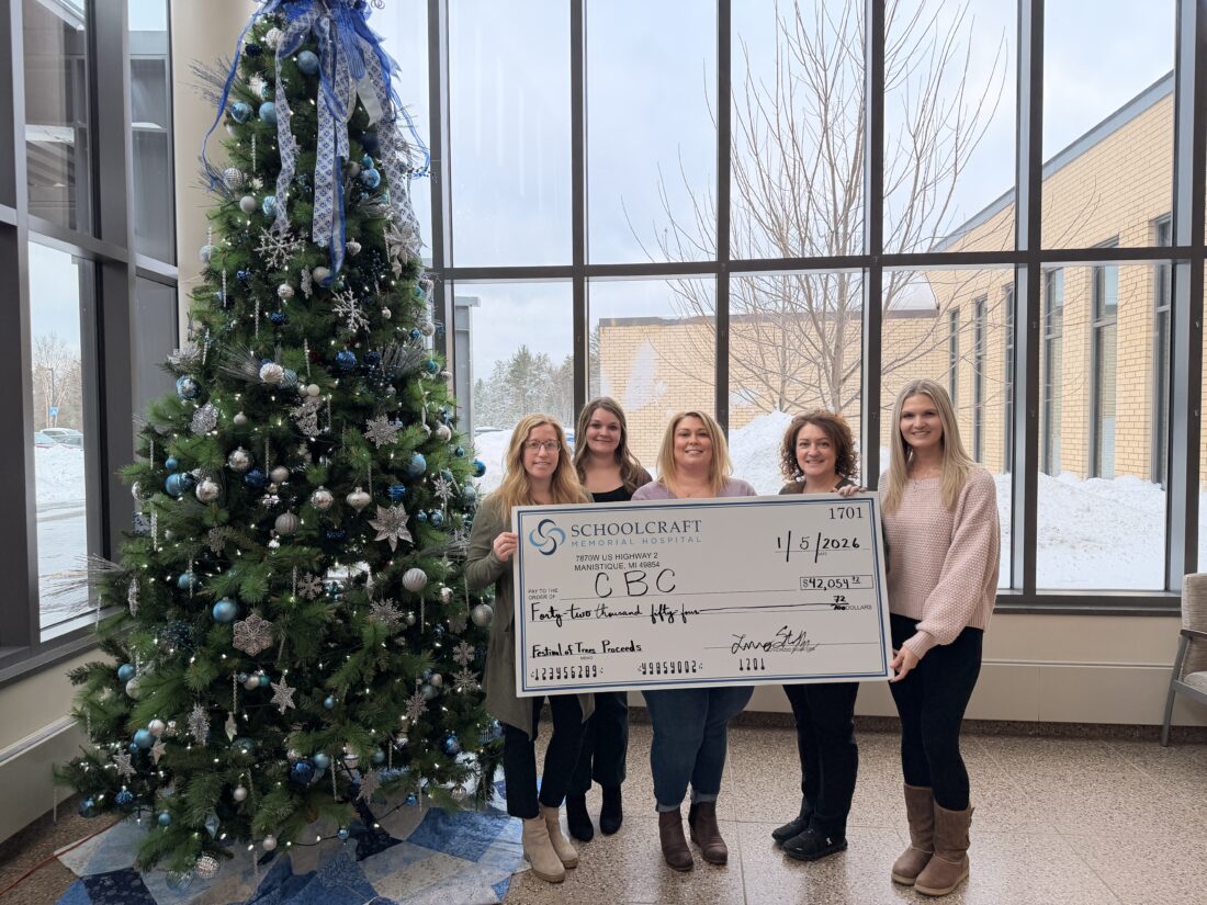 Hospital donates $42K raised at holiday festival
